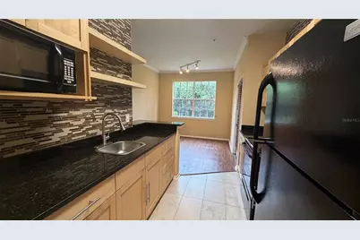 2668 Robert Trent Jones Drive #413, Orlando, FL 32835 - Photo 10
