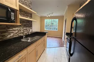 2668 Robert Trent Jones Dr, Orlando, FL 32835 - Photo 10