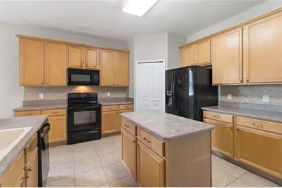 6658 Lake Pembroke Place, Orlando, FL 32829 - Photo 16