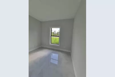 445 Wickham Avenue S, Lehigh Acres, FL 33974 - Photo 26
