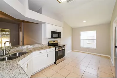8516 Canterbury Lake Boulevard, Tampa, FL 33619 - Photo 6
