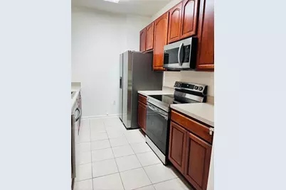 8775 Sartori Street #301, Orlando, FL 32829 - Photo 2