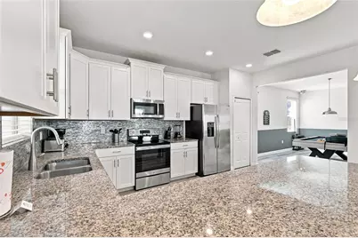 1541 Mulligan Boulevard, Champions Gate, FL 33896 - Photo 12