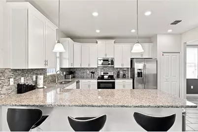 1541 Mulligan Boulevard, Champions Gate, FL 33896 - Photo 14