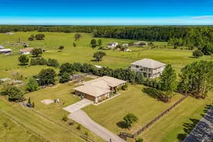 18030 Bayamon Ave, Polk City, FL 33868 - Photo 8