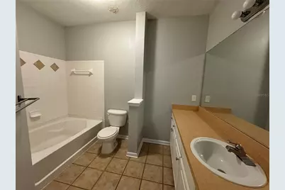 12831 Madison Pointe Circle #104, Orlando, FL 32821 - Photo 10