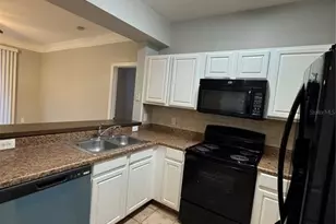 12831 Madison Pointe Cir, Orlando, FL 32821 - Photo 4