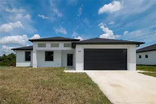 943 Commodore St, Lehigh Acres, FL 33974 - Photo 1