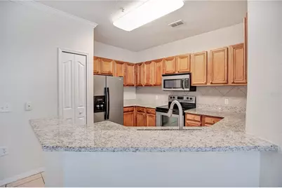 6119 Metrowest Boulevard #103, Orlando, FL 32835 - Photo 8