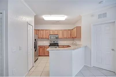 6119 Metrowest Boulevard #103, Orlando, FL 32835 - Photo 10