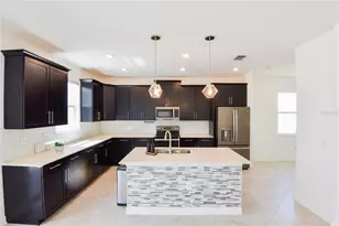 8904 Leaderboard Ln, Champions Gate, FL 33896 - Photo 8