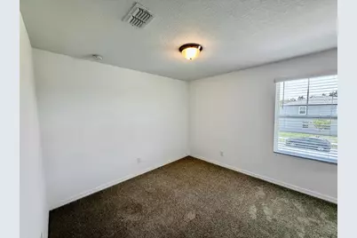 4497 Burrowing Owl Loop, Saint Cloud, FL 34772 - Photo 12
