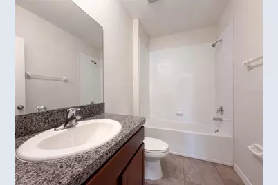 10448 Carloway Hills Drive, Wimauma, FL 33598 - Photo 18