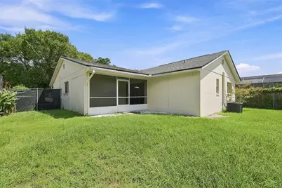 7720 Lakeside Woods Drive, Orlando, FL 32810 - Photo 18