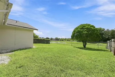 7720 Lakeside Woods Drive, Orlando, FL 32810 - Photo 20
