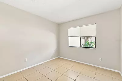 7720 Lakeside Woods Drive, Orlando, FL 32810 - Photo 12