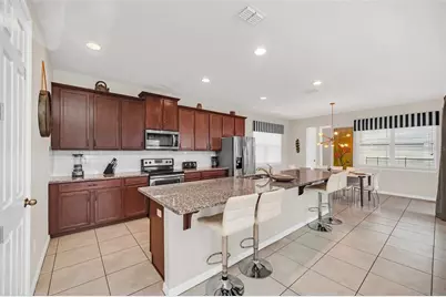 9001 Egret Mills Terrace, Kissimmee, FL 34747 - Photo 16