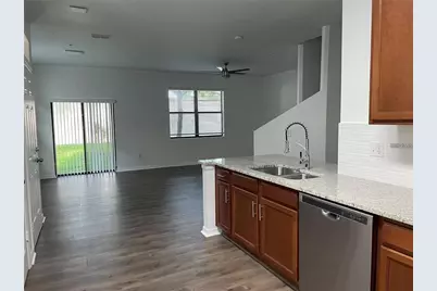 3408 Seneca Club Loop #30-102 Unit B, Orlando, FL 32808 - Photo 4