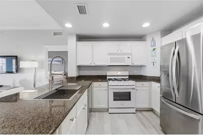 7603 Heritage Crossing Way #202, Reunion, FL 34747 - Photo 6