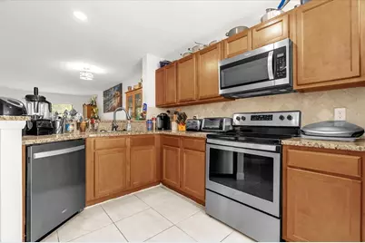 7421 Sugar Bend Drive #7421, Orlando, FL 32819 - Photo 10