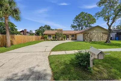 4165 Rolling Springs Drive, Tampa, FL 33624 - Photo 1
