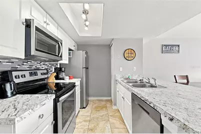 2486 Sweetwater Club Circle #75, Kissimmee, FL 34746 - Photo 6
