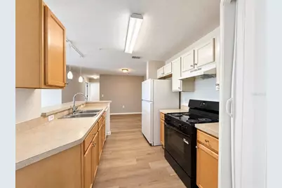 5848 Lake Pointe Village Circle #411, Orlando, FL 32822 - Photo 6