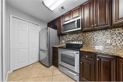 7511 Seurat Street #10201, Orlando, FL 32819 - Photo 10