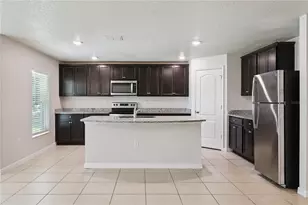 1694 Hideaway Flat St, Mascotte, FL 34753 - Photo 14