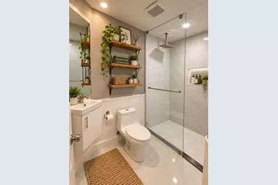 179 Dahlia Village Circle #63, Orlando, FL 32807 - Photo 12