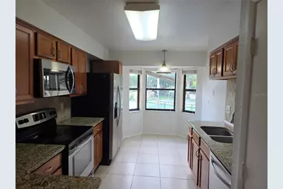 7867 Sugar Bend Drive #7867, Orlando, FL 32819 - Photo 12