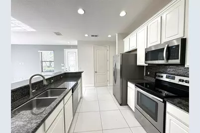 8474 Kelsall Drive, Orlando, FL 32832 - Photo 16