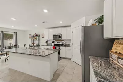 8693 Triumph Circle, Wildwood, FL 34785 - Photo 10