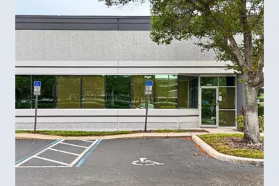 7751 Kingspointe Parkway #104, Orlando, FL 32819 - Photo 2