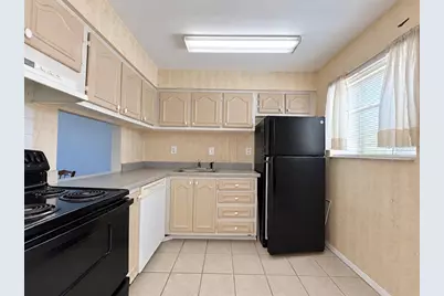 2854 N Powers Drive #102, Orlando, FL 32818 - Photo 6