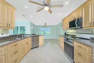12001 SW Kingsway Cir, Lake Suzy, FL 34269 - Photo 24