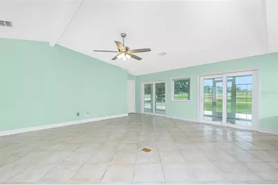 12001 SW Kingsway Circle, Lake Suzy, FL 34269 - Photo 12