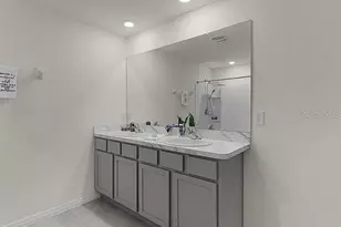 8661 Triumph Cir, Wildwood, FL 34785 - Photo 14