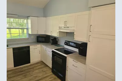 11001 SE Sunset Harbor Rd #C27, Summerfield, FL 34491 - Photo 10