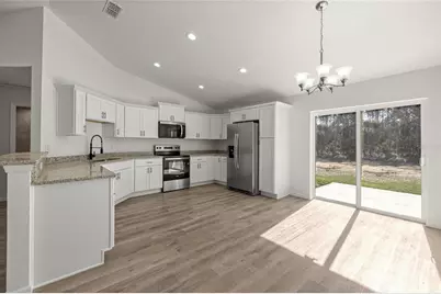 24698 NW Sutton Avenue, Dunnellon, FL 34431 - Photo 10