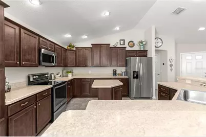 16777 SE 74 Soulliere Avenue, The Villages, FL 32162 - Photo 16