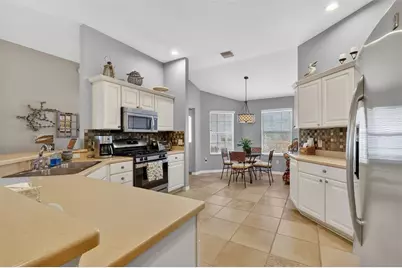 7814 SE 166th Smallwood Place, The Villages, FL 32162 - Photo 12