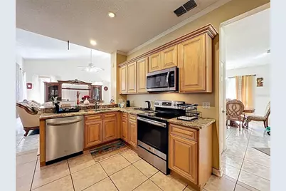 7345 Woodworth Way, Orlando, FL 32818 - Photo 18