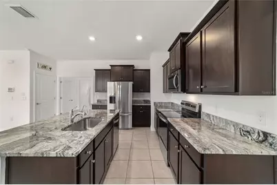 5051 Stokes Way, Wildwood, FL 34785 - Photo 12