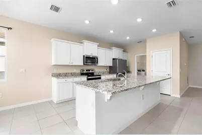 7974 Penrose Place, Wildwood, FL 34785 - Photo 14