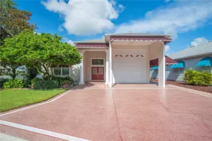 1075 Motorcoach Dr, Polk City, FL 33868 - Photo 1