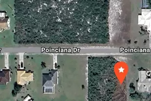 7 Poinciana Dr, Indian Lake Estates, FL 33855 - Photo 1