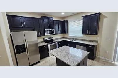 9637 Silver Buttonwood Street, Orlando, FL 32832 - Photo 4