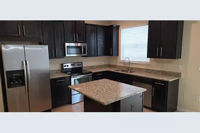 9637 Silver Buttonwood Street, Orlando, FL 32832 - Photo 4