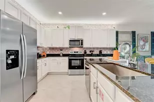 7458 Gathering Dr, Reunion, FL 34747 - Photo 32